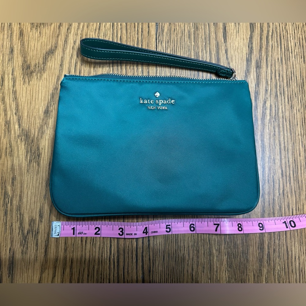 Kate Spade emerald green wristlet. Like new.